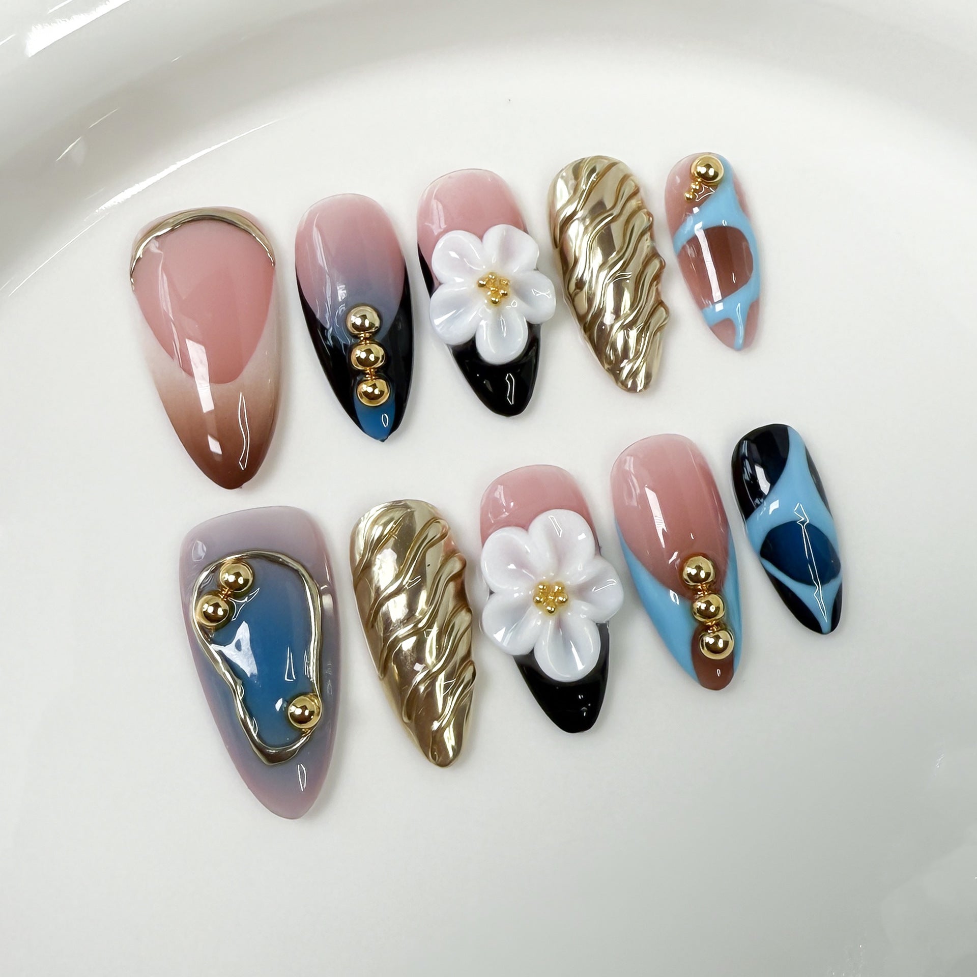 Trendy Press-On Nails with Gold Accents and Floral 3D Details