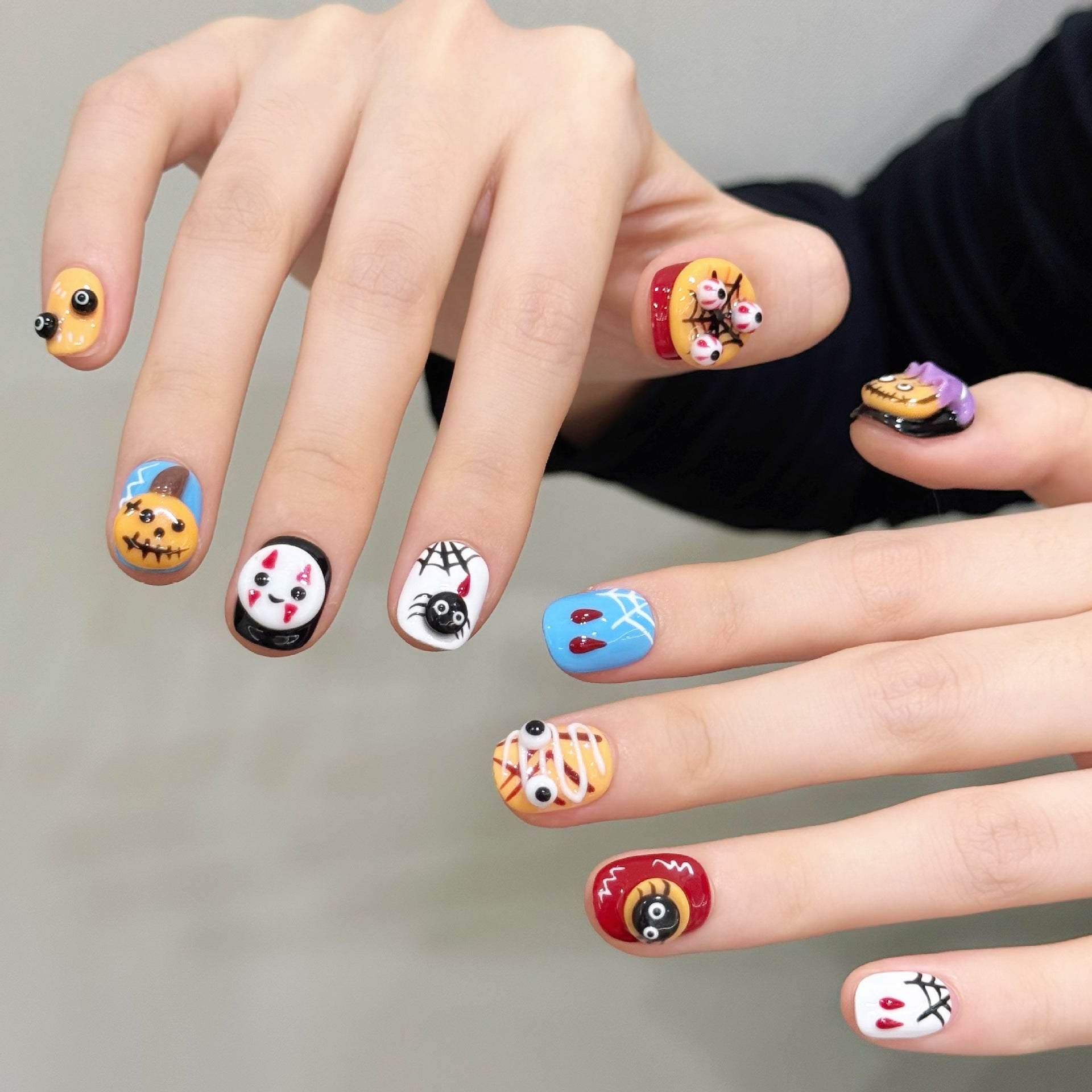 Colorful Halloween Cartoon Nails with Spooky Details