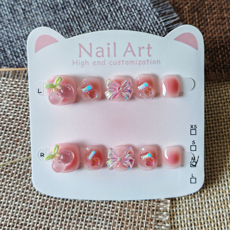 365nails: "peach jelly cherry bow" – short handmade kids press-on nails