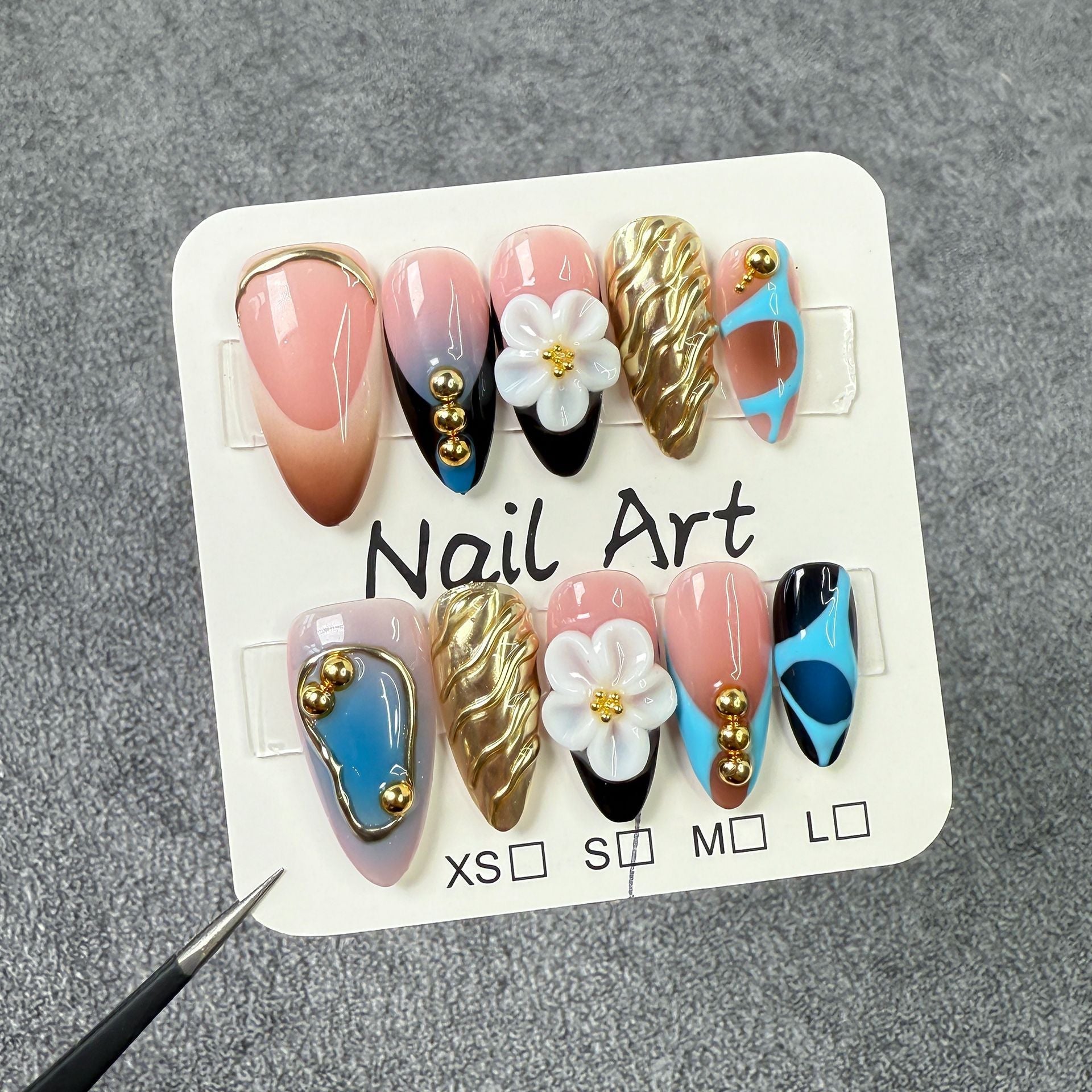 Trendy Press-On Nails with Gold Accents and Floral 3D Details