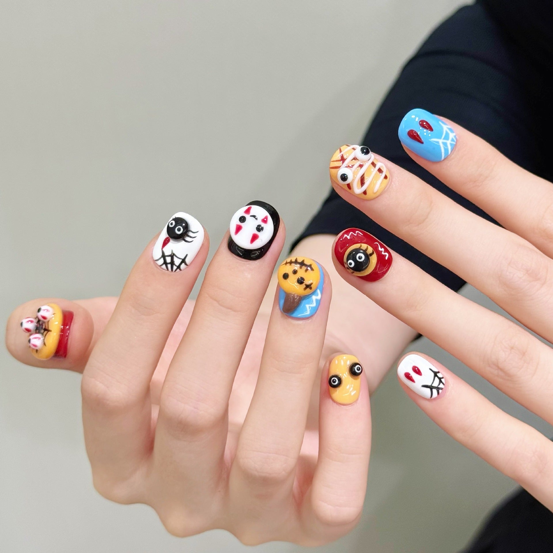 Colorful Halloween Cartoon Nails with Spooky Details